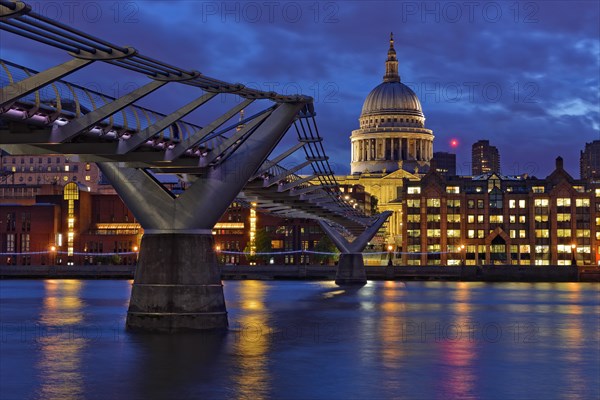 Millennium Bridge and St Paul's Cathedral at dusk