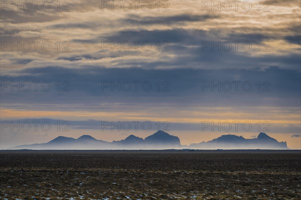 View from the mainland to the Westman Islands with cloudy sky