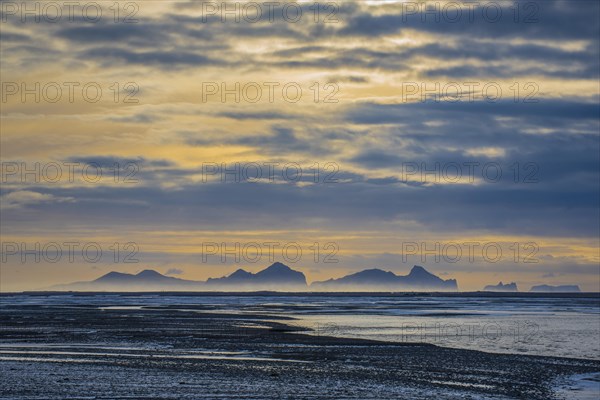 View from the mainland to the Westman Islands with cloudy sky