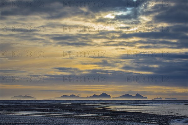 View from the mainland to the Westman Islands with cloudy sky