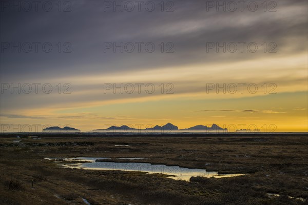 View from the mainland to the Westman Islands at sunset