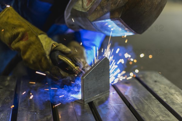 Welding with sparks on metal