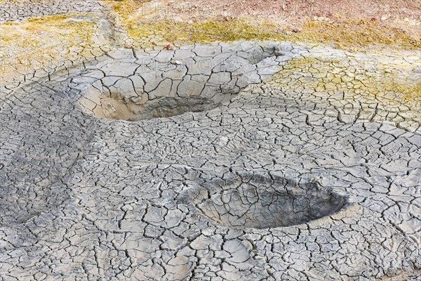 Dried soil with sulphur deposits