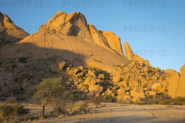 A Spitzkoppe peak in evening light in Erongo Region