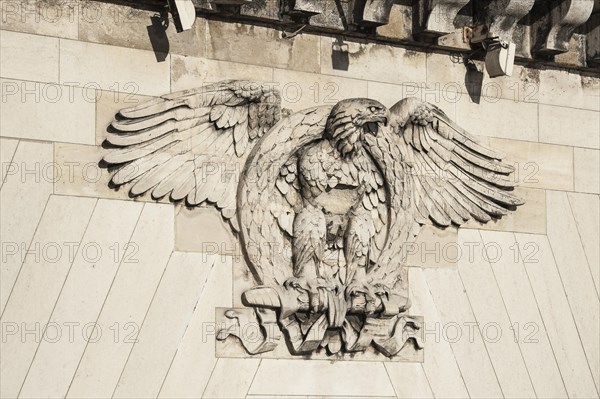 Heraldic animal eagle with a laurel wreath