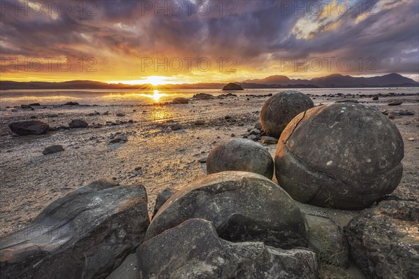 Koutu Boulders with sun star at sunset