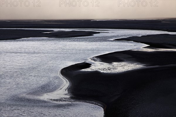 Glacial runoff permeate the volcanic sand plain Skeidararsandur