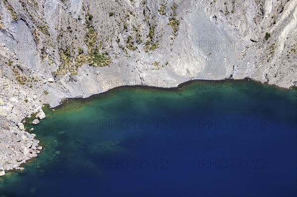 Blue crater lake in the main crater of Irazu Volcano