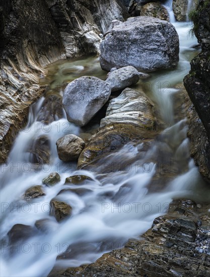 Water flowing around rocks