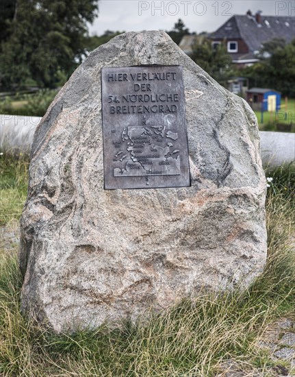 Sign on a glacial boulder stone with information