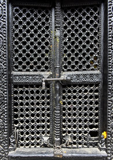 Artfully carved window grilles in traditional Newar style in Kumari Chowk inner courtyard