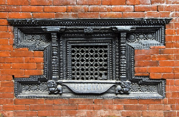 Artfully carved window grilles in traditional Newar style in Kumari Chowk inner courtyard