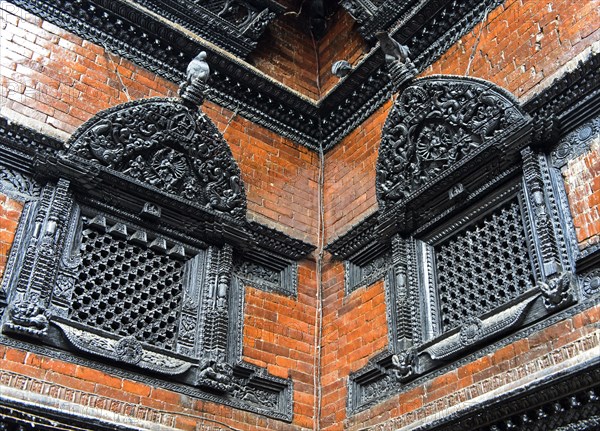 Artfully carved window grilles in traditional Newar style in Kumari Chowk inner courtyard