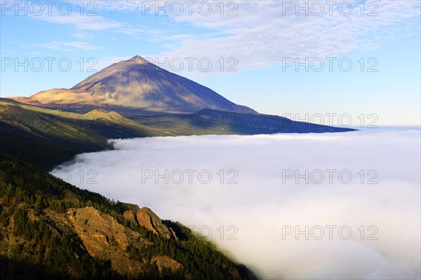 Pico del Teide at sunrise over trade wind clouds