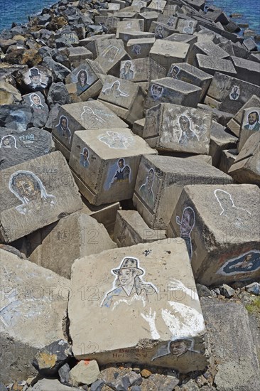 Pictures of famous musicians painted on stones