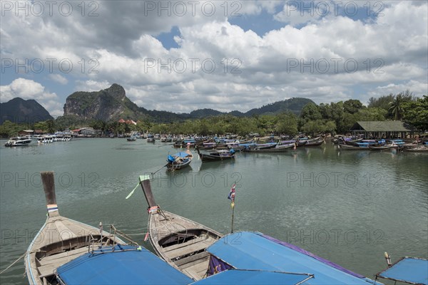 Longtail boat in port