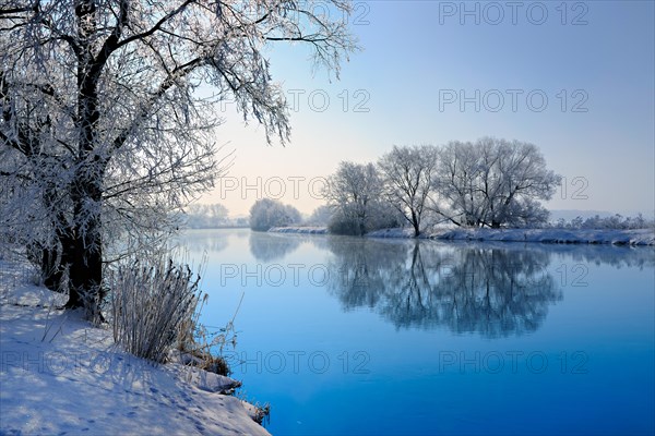 River landscape in winter at the river Saale
