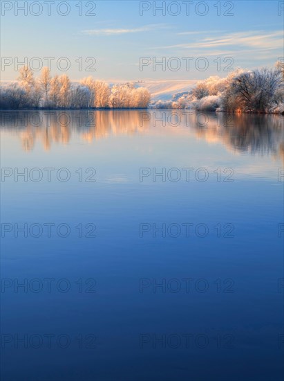River landscape in winter at the river Saale