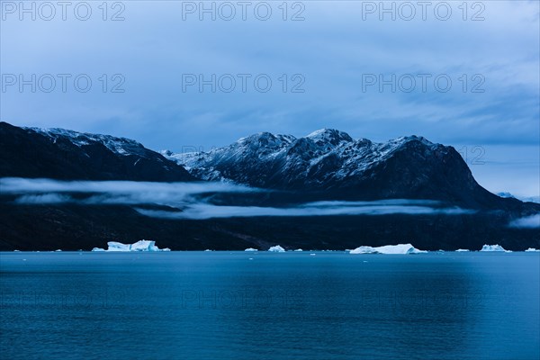 Drift ice in Scoresbysund at dawn