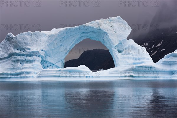 Ice bow in Scoresbysund at dawn