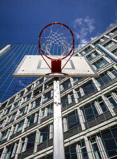 Basketball basket in front of house