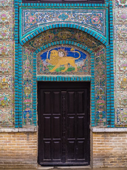 Tile picture over wooden door