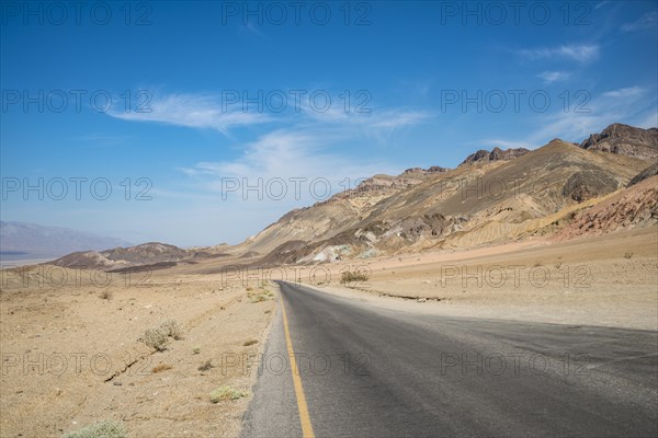 Road through desert landscape