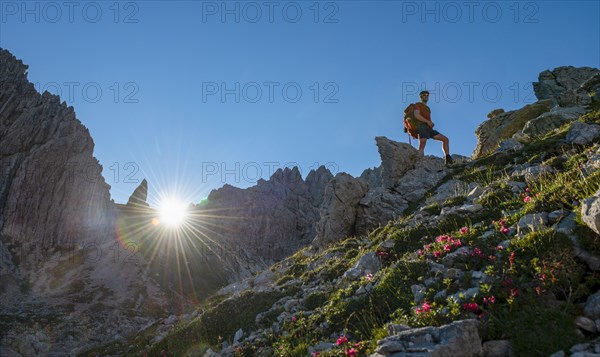 Hiker stands on a rock