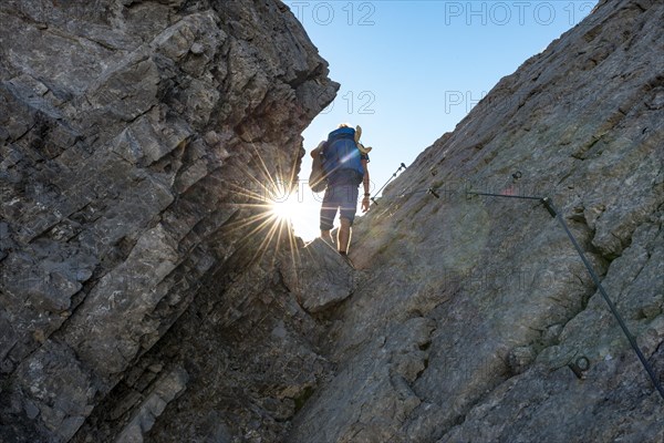 Hiker at the Scharte at the Kreuzspitze