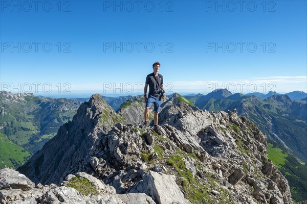 Hiker at the Scharte at the Kreuzspitze