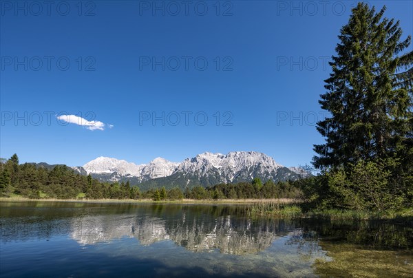 Western Karwendelspitze reflected in Lake Luttensee