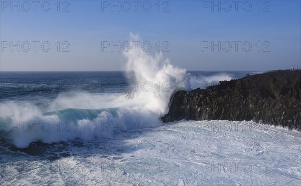 Surf at rocky coast