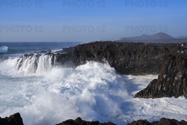 Surf at rocky coast