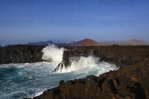 Surf at rocky coast