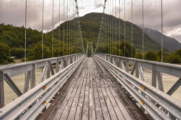 Suspension bridge over Rio Exploradores near Puerto Rio Tranquilo