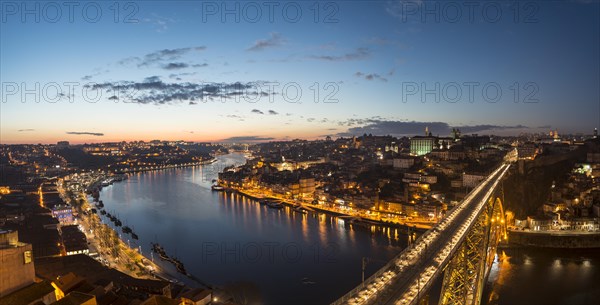 View over Porto with illuminated Ponte Dom Luis I Bridge across River Douro