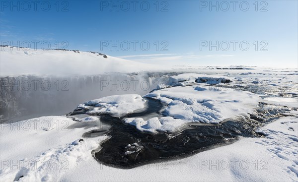 Hafragilsfoss Waterfall in winter