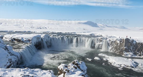 Gooafoss Waterfall in winter with snow and ice