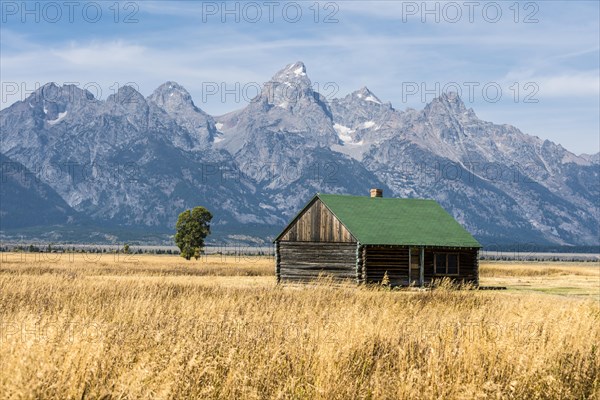 Old barn in front of the Teton Range mountain range