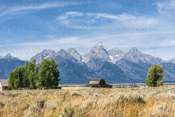 Historic old barn in front of the Teton Range mountain range