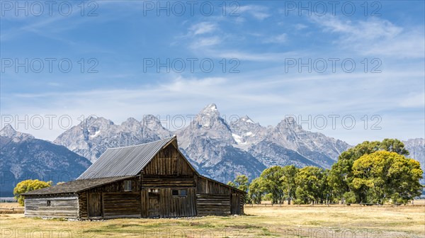 Historic old barn in front of the Teton Range mountain range