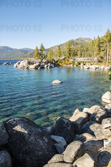 Round stones in turquoise water