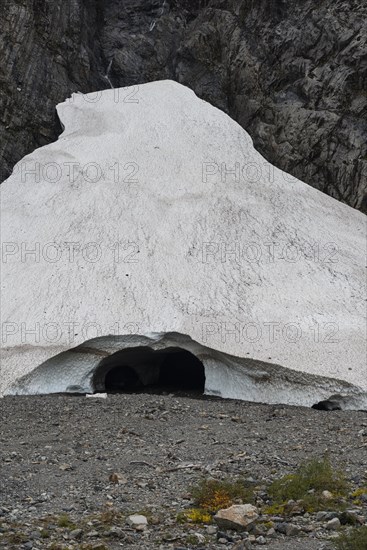 Entrance of an ice cave of a glacier