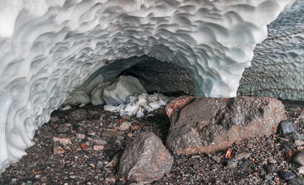 Entrance of an ice cave of a glacier