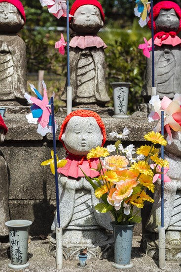 Jizo statues with red caps