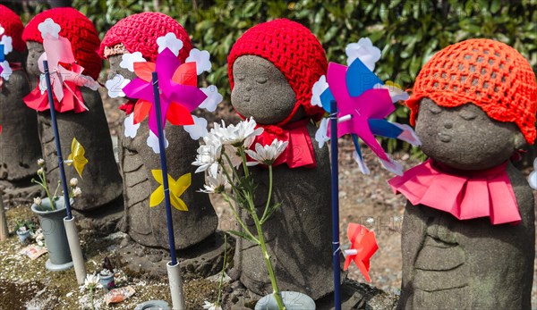 Jizo statues with red caps