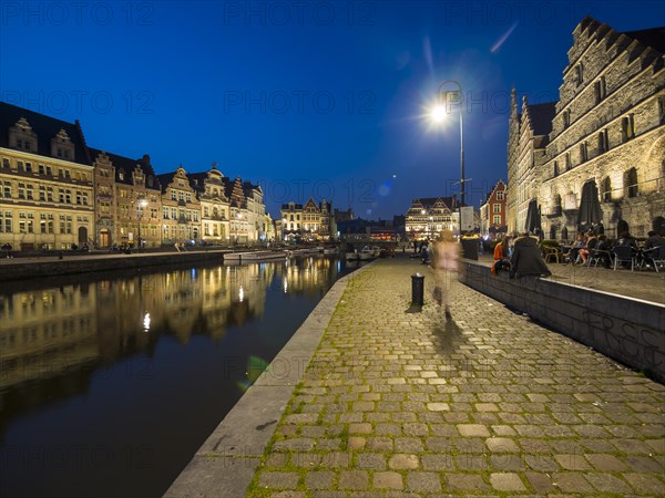 Promenade with old guildhalls on the Lys