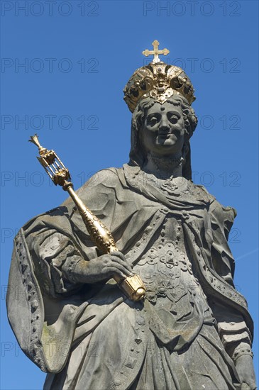 Detail of the statue Empress Kunigunde with crown and scepter