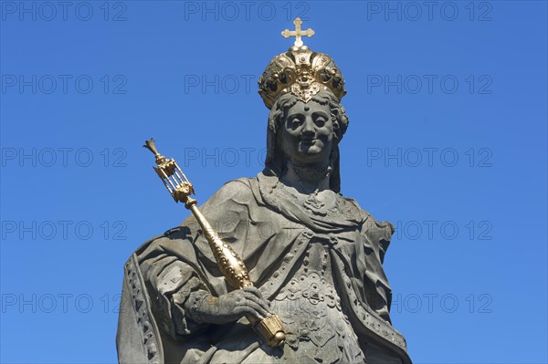 Detail of the statue Empress Kunigunde with crown and scepter