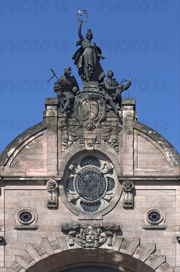 Ornametal gable from the Opera House with coat of arms of Nuremberg and sculptures